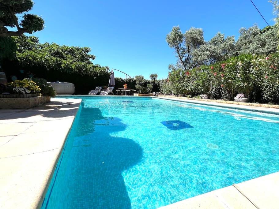Le Jardin De Mae Apartment Bouc Bel Air Bagian luar foto